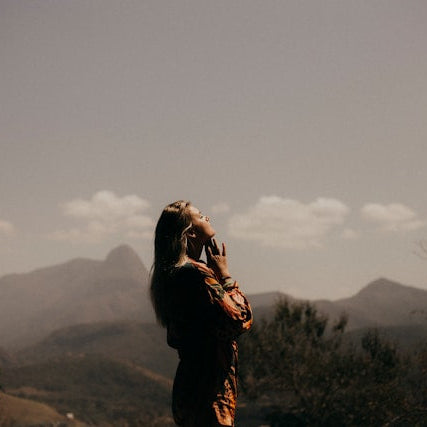 a woman looking at something up above